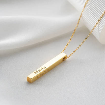 Halsband i rostfritt stål med guldfärgad vertikal stång